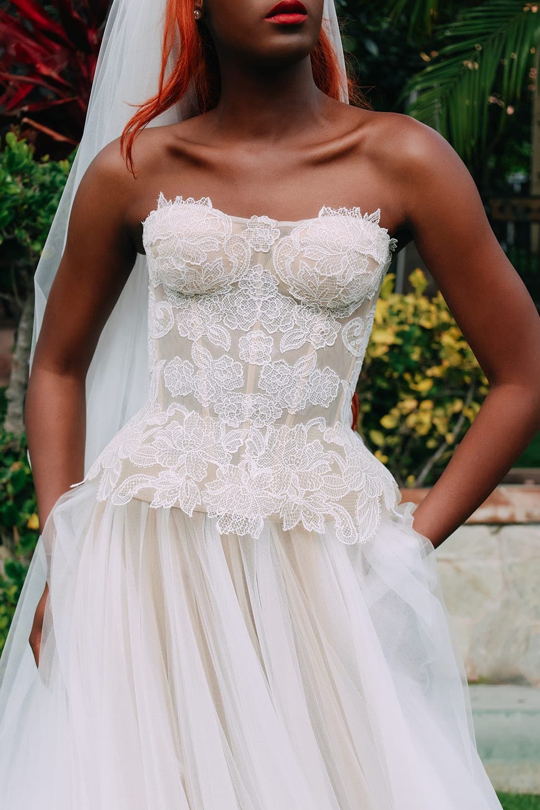 Sheer lace corset bodice detail, hand-finished at the atelier