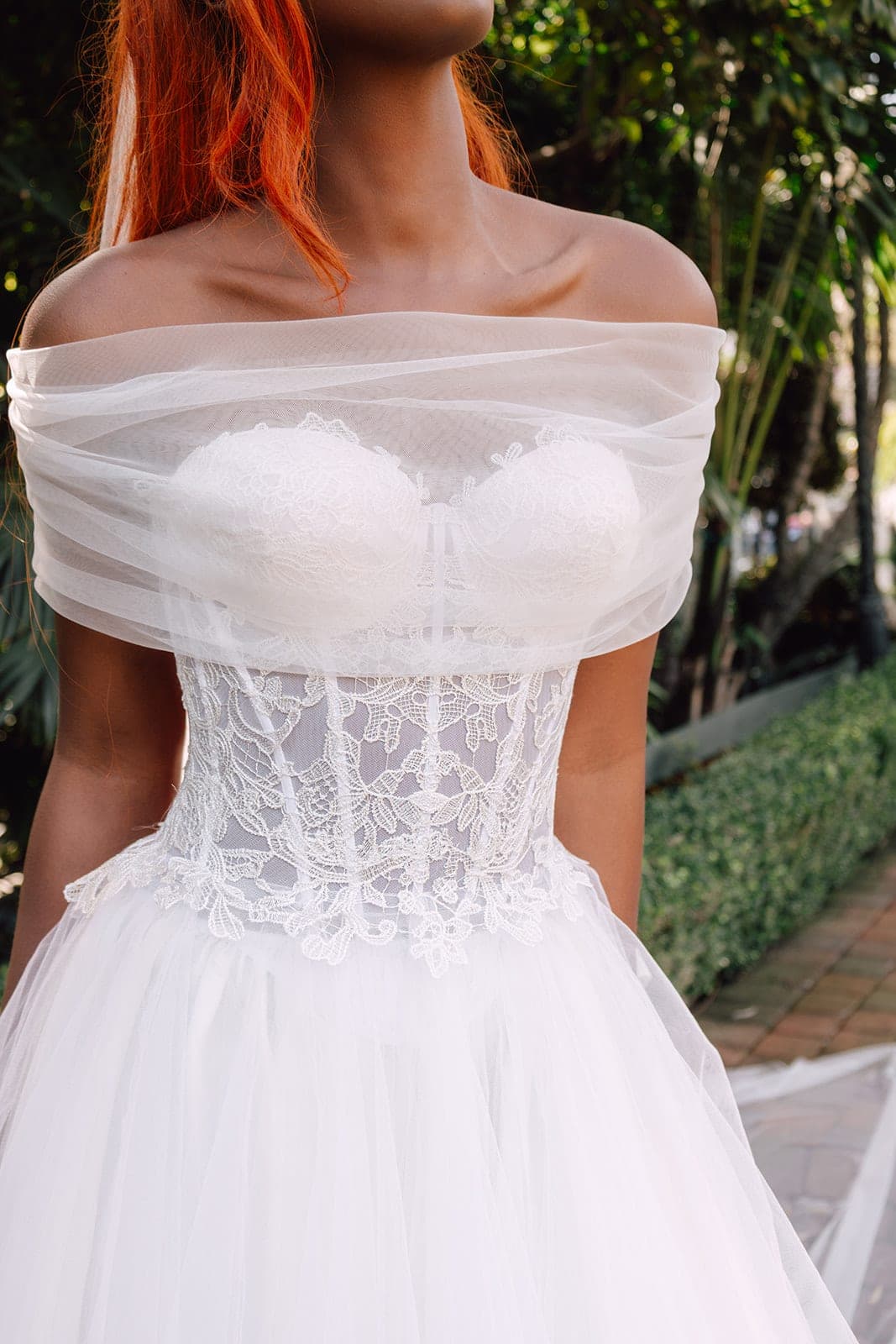 Lace corset meeting layers of Italian honeycomb tulle, detail